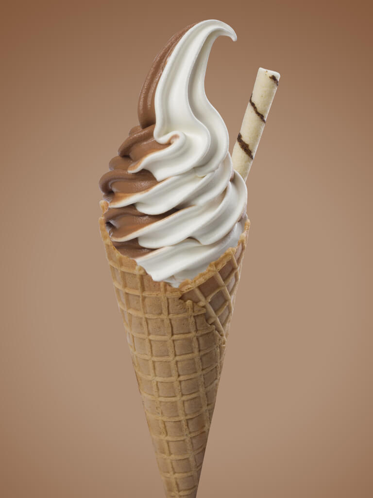 ice cream cornet with chocolate sauce